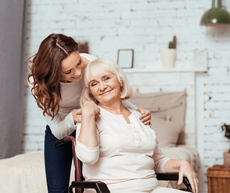 A woman embracing another woman.